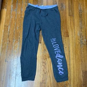 Gray sweatpants with purple accents